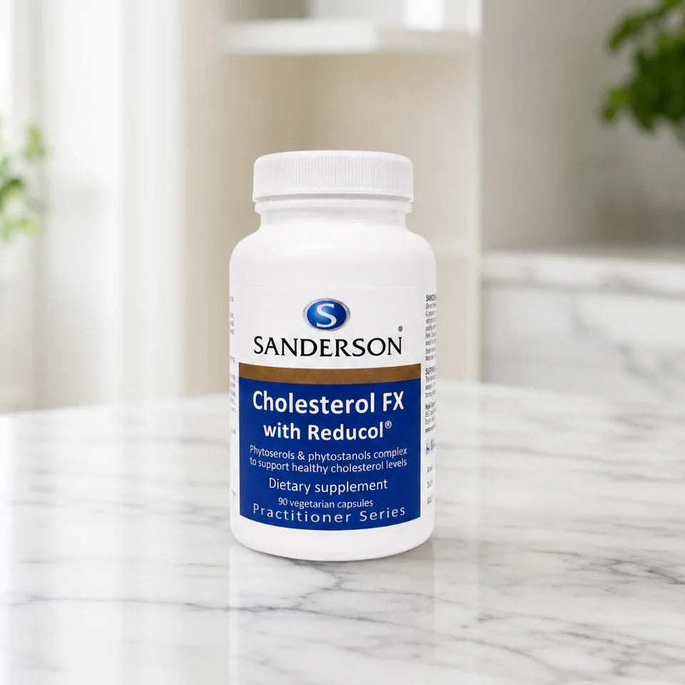 Sanderson Cholesterol FX bottle on a white marble counter with plants