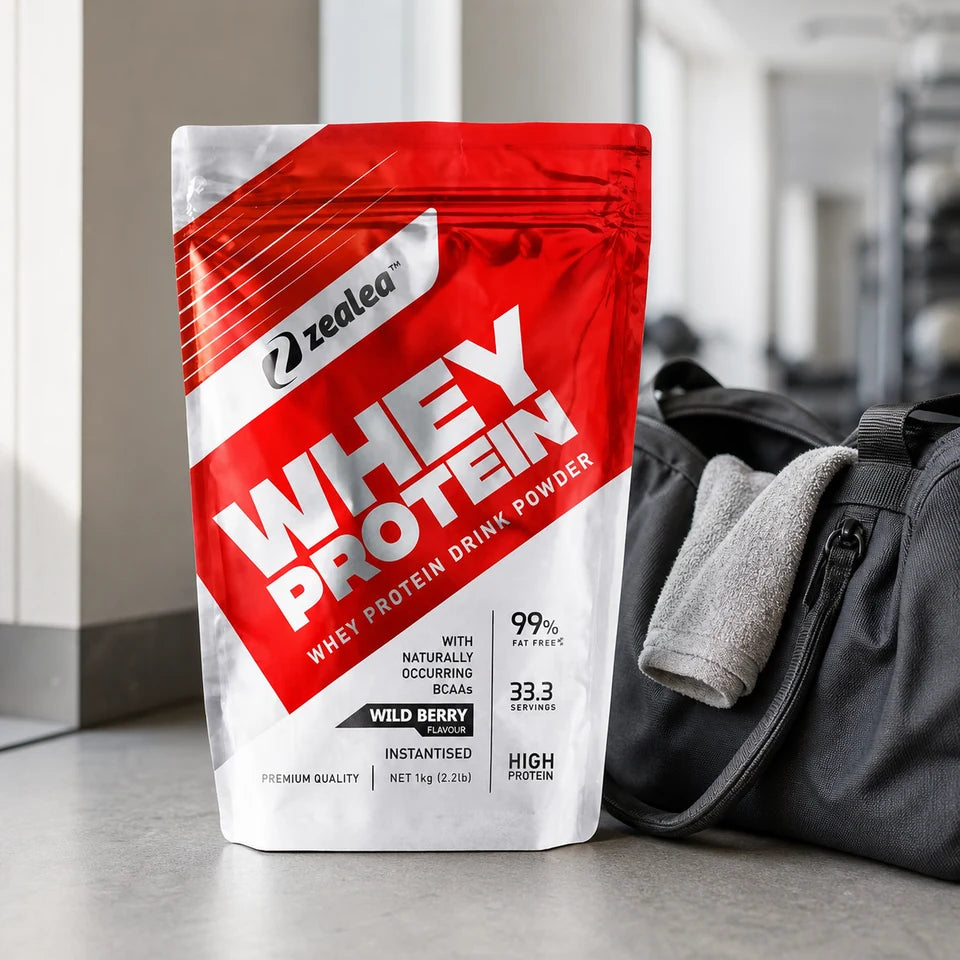 Zealea Whey Protein beside a gym bag
